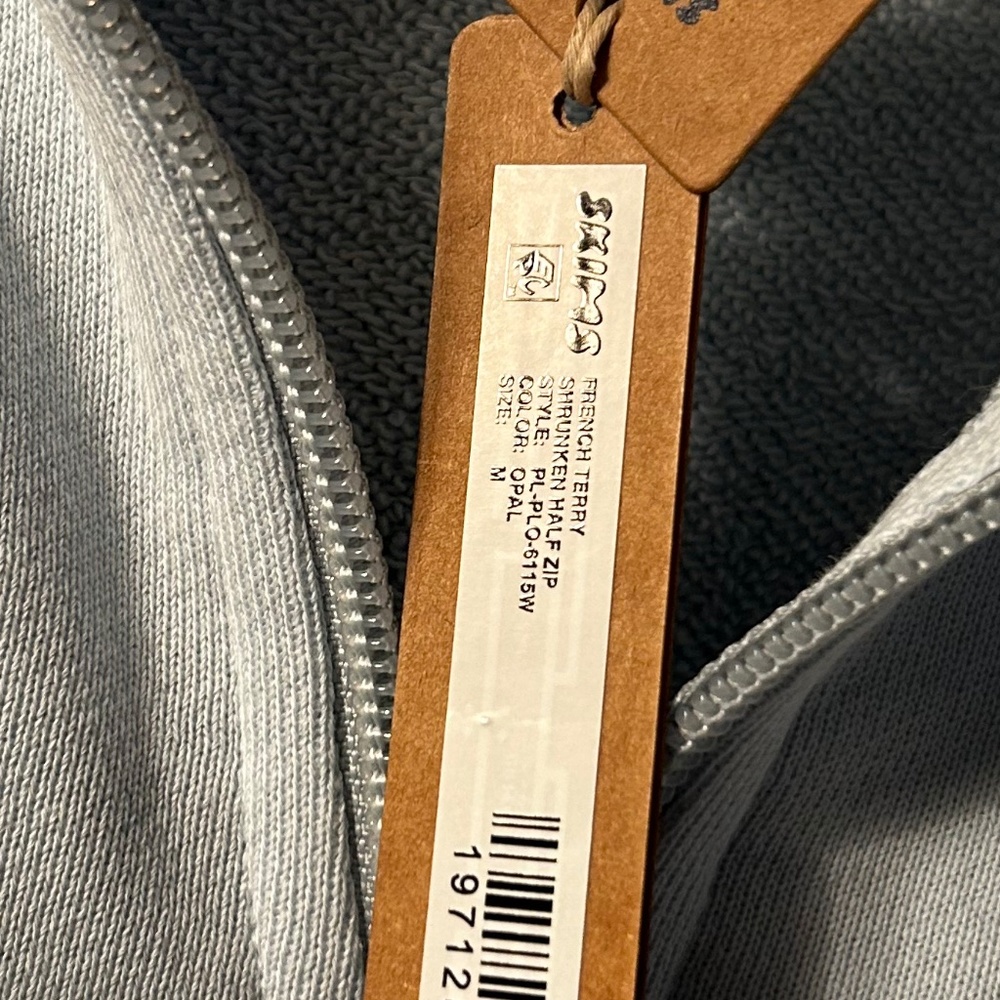 Terry, light blue cropped half zip sweatshirt